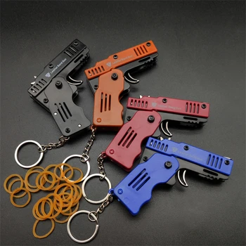 Yaratıcılık hediye erkek arkadaşı için Anahtarlık mini katlanır lastik bant tabancası 6 patlamaları çocuk oyuncak yumuşak kurşun silah parti noel hediyesi